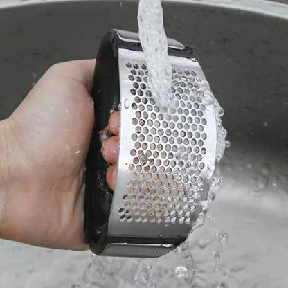 Presse ail à bascule.